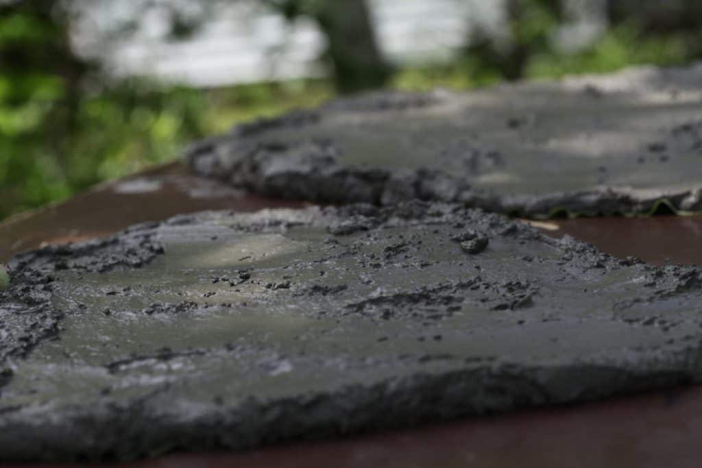 concrete covered leaves on a table