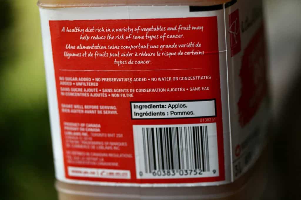 a label on store-bought fresh pressed apple cider, showing that it only has one ingredient: apples