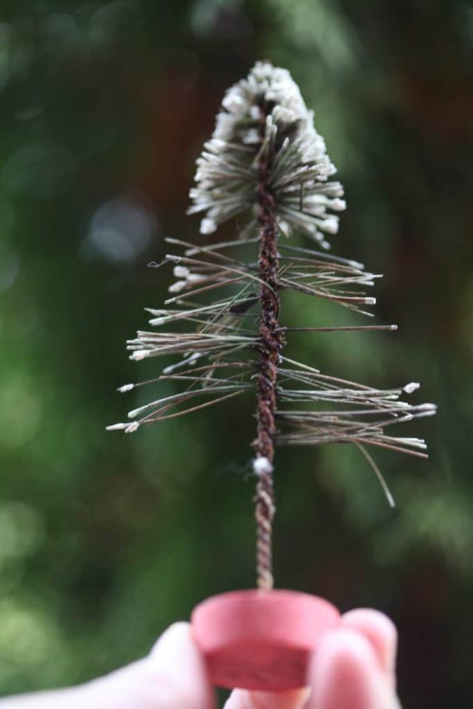 vintage bottle brush Christmas tree that has lost many bristles