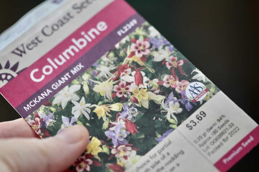 a Columbine seed packet full of  Mckana hybrid Columbine seeds