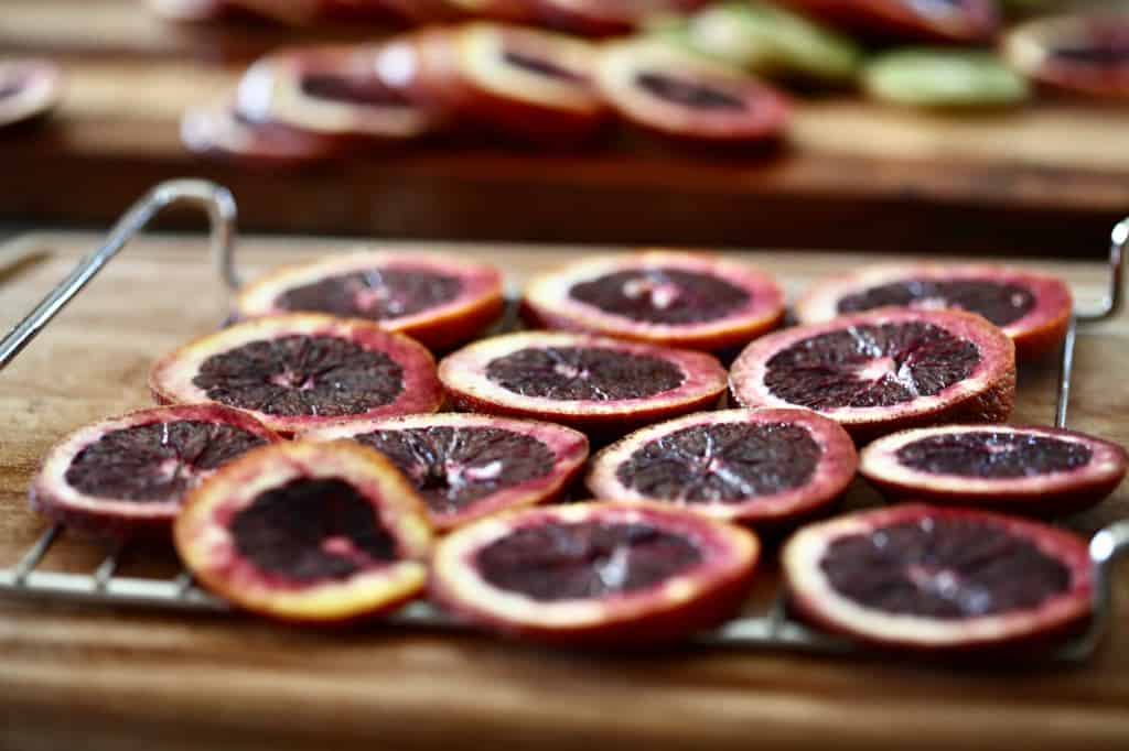 blood orange slices on a tray to go into the air fryer for dehydrating