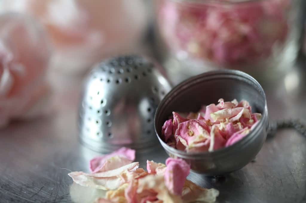 dried rose petals in a tea ball
