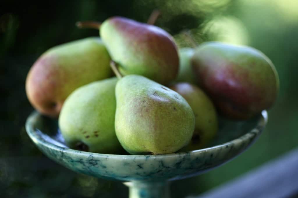 a platter of fresh pears
