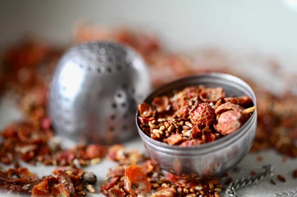 dried rose hips for tea, in a tea ball