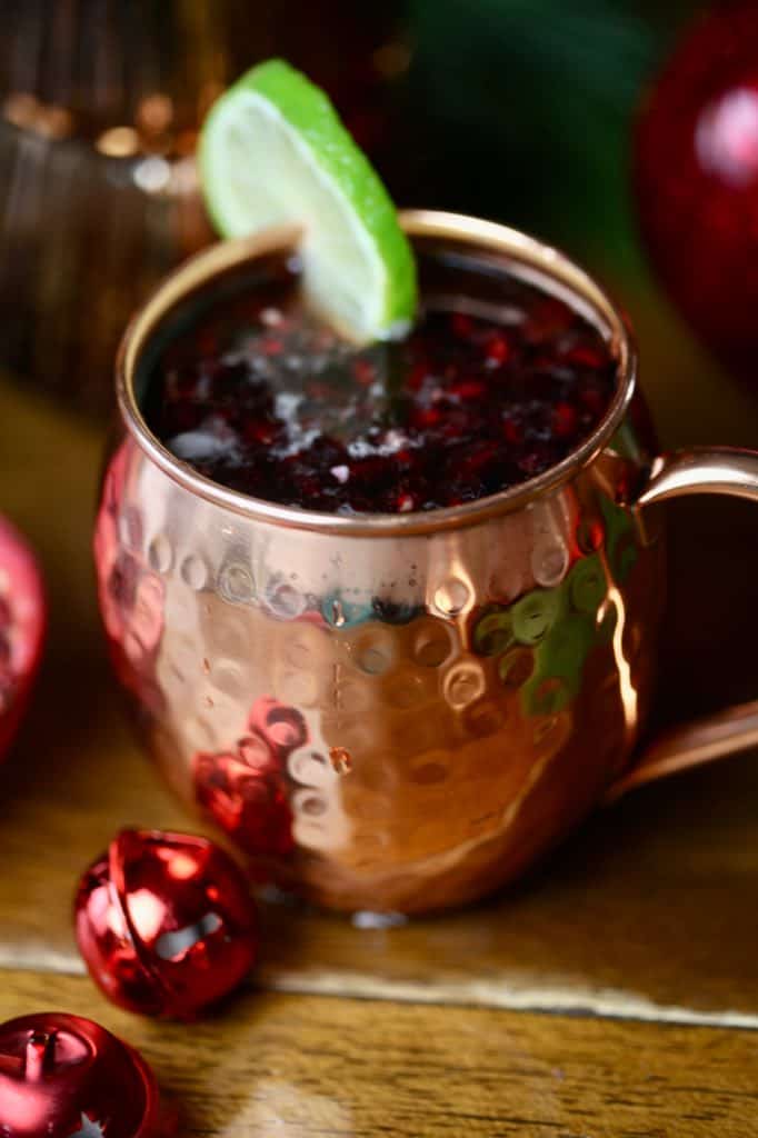 a copper mug filled with Christmas mule