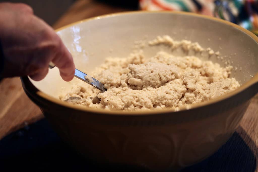 yellow bowl with mixture of moist cassava