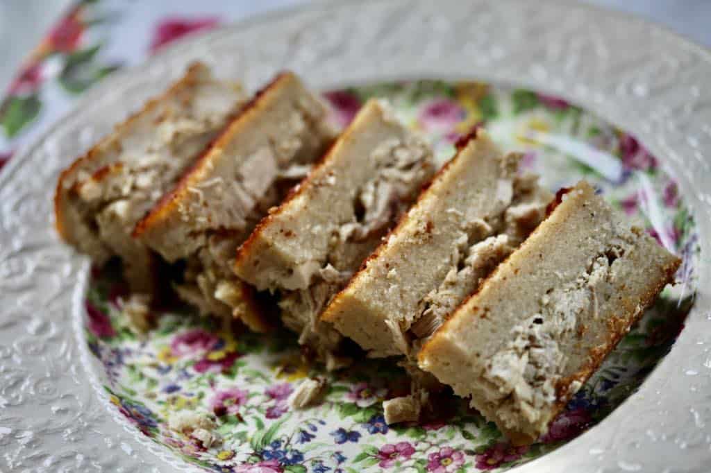 sliced cassava pie on a plate