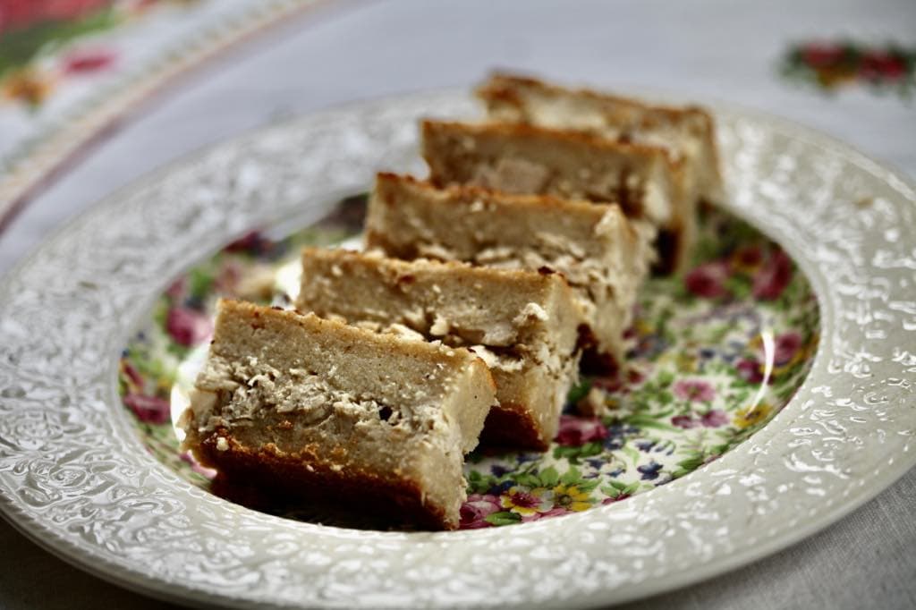 five pieces of cassava pie on a plate